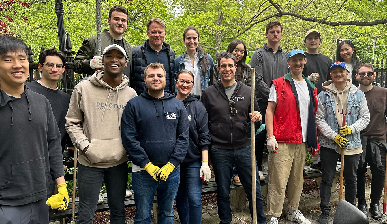 FundApps US team volunteering outside. Our team lends a helping hand in enabling compliance teams to respond to regulatory change more efficiently. 