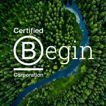 River flowing through a forest with B-Corp logo in front. Flow through this journey with FundApps and begin to discover solutions for the planet. 