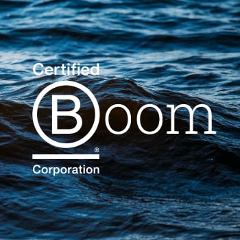 Blue sea waves with B Corp logo in front. Wave goodbye to stress, as at FundApps we reduce any complexity associated with compliance processes.