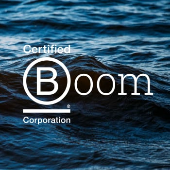 Blue sea waves with B-Corp logo in front. Wave goodbye to stress, as at FundApps we reduce any complexity associated with compliance processes. 