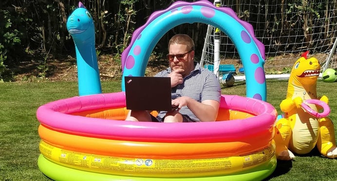 Jonny working in a paddling pool