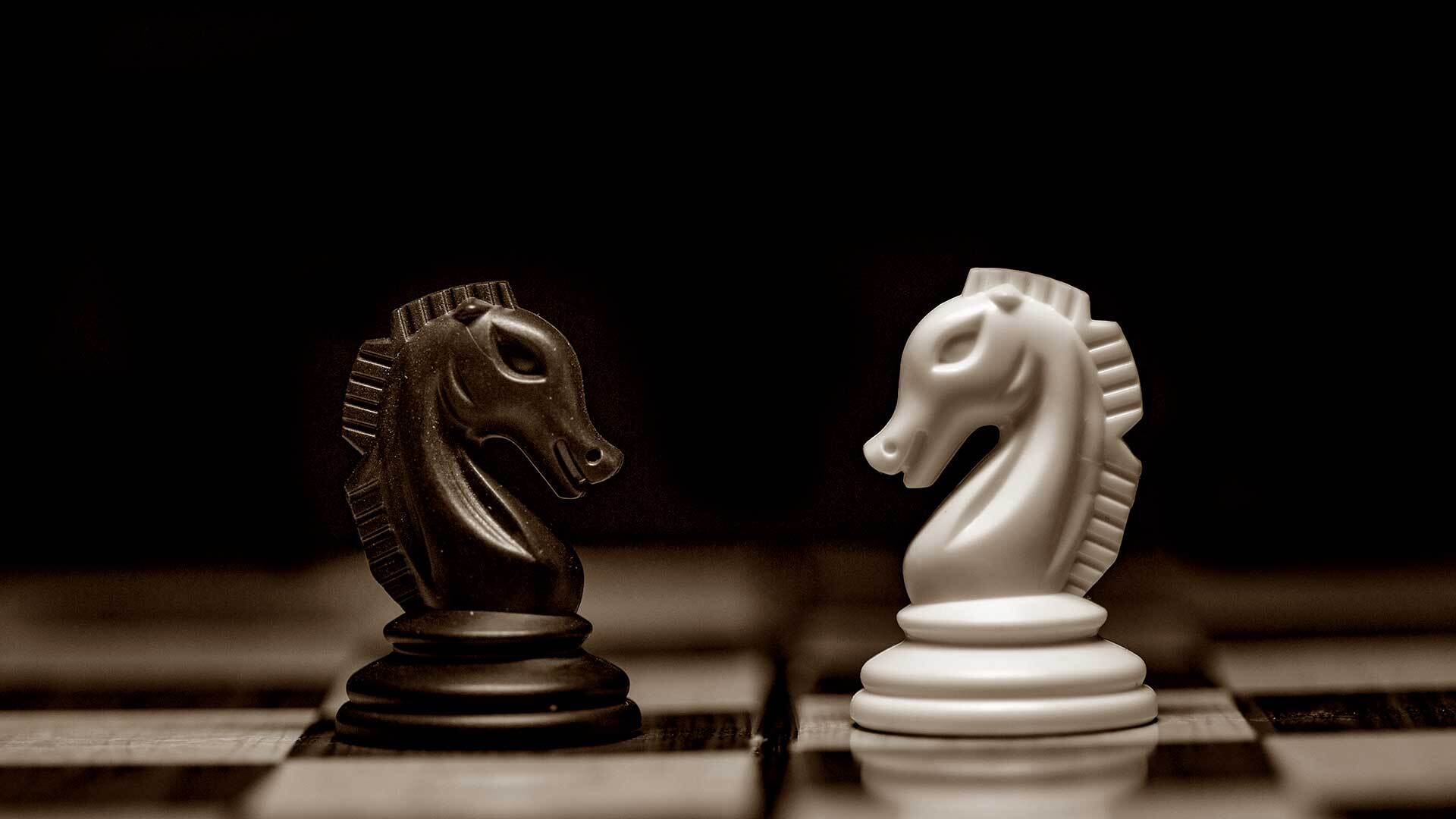 It's time for firms to battle it out and reshape their compliance strategies for the SEC. Two knight chess pieces facing each other 