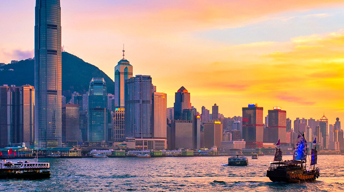 Viridian Asset Management leverages FundApps’ Shareholding Disclosure solution. Hong Kong skyline at sunset